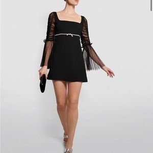 Black self portrait dress with crystal bow detail and lace sleeves